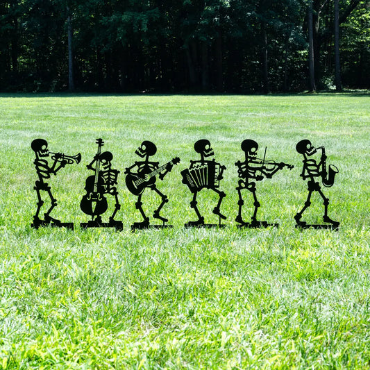 Halloween Musician Skeleton Yard signs lined up in a grassy field, perfect for festive Halloween decor.