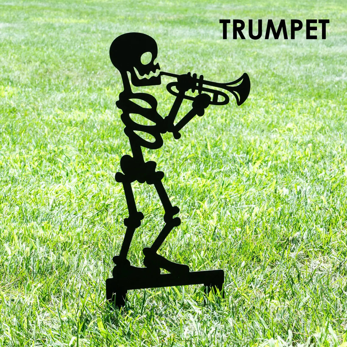 Halloween Musician Skeleton Yard signs featuring a skeleton playing trumpet on a grassy yard.