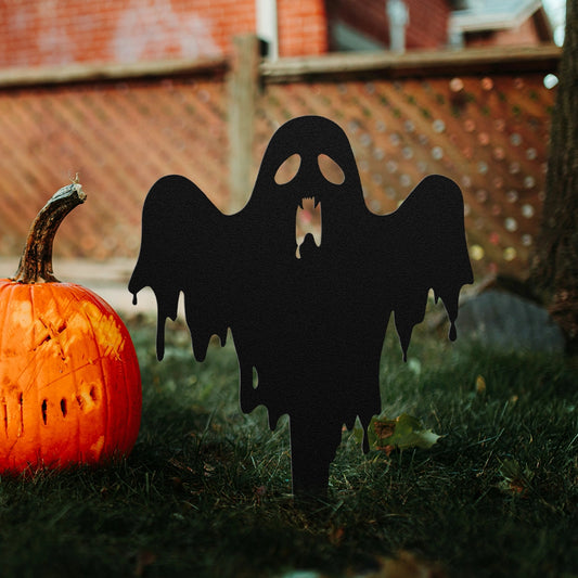 Halloween Scary Boo Yard Decor featuring a ghost silhouette in front of a carved pumpkin.